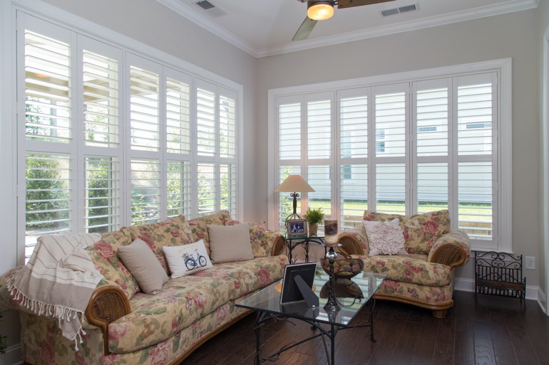 Sunroom with faux wood shutters in Cleveland.